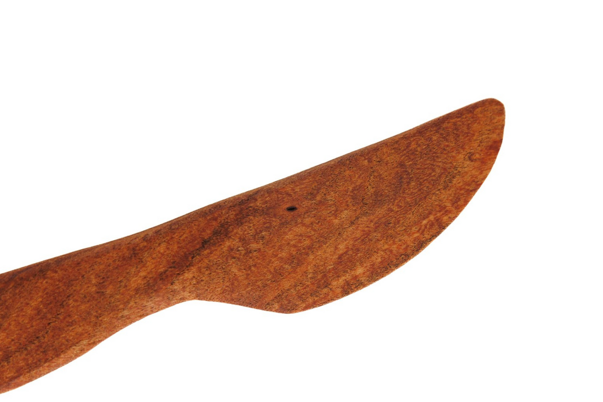 Close-up of a handcrafted wooden spreader knife from The Boardsmith utensil set