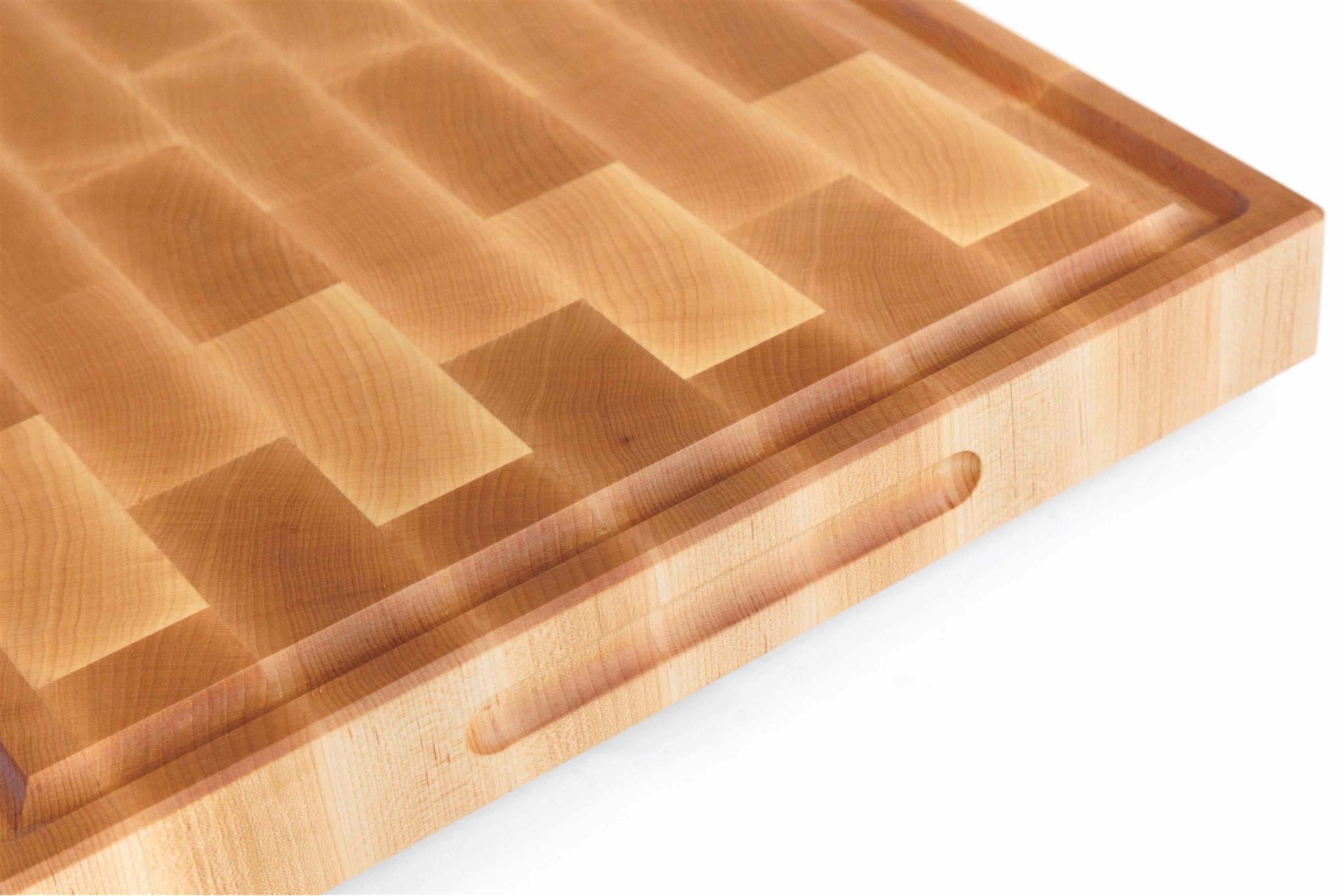 Close-up of the Maple End Grain Cutting Board by The Boardsmith highlighting intricate wood patterns.
